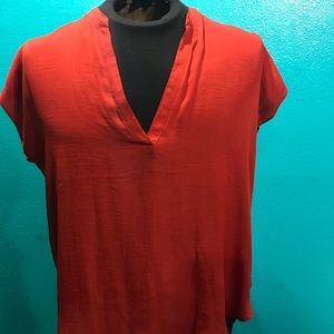 Orange v neck blouse